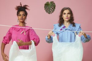 women holding plastic bags